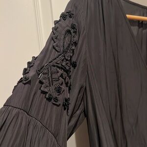 Ramy Brook black w crop and elegant embellishments